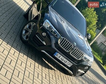 Черный БМВ Х4, объемом двигателя 2 л и пробегом 140 тыс. км за 20500 $, фото 1 на Automoto.ua