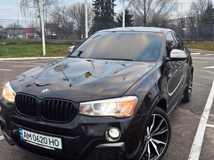 Черный БМВ Х4, объемом двигателя 2.98 л и пробегом 77 тыс. км за 33800 $, фото 1 на Automoto.ua