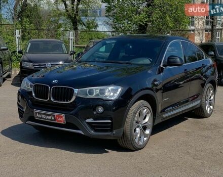 Черный БМВ Х4, объемом двигателя 2 л и пробегом 162 тыс. км за 19140 $, фото 1 на Automoto.ua