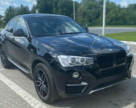 Чорний БМВ Х4, об'ємом двигуна 2 л та пробігом 71 тис. км за 28900 $, фото 1 на Automoto.ua