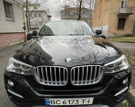 Черный БМВ Х4, объемом двигателя 2 л и пробегом 177 тыс. км за 19950 $, фото 1 на Automoto.ua