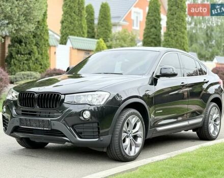 Черный БМВ Х4, объемом двигателя 2 л и пробегом 91 тыс. км за 25700 $, фото 1 на Automoto.ua