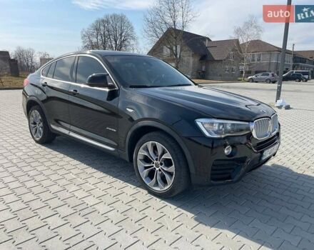 Черный БМВ Х4, объемом двигателя 2 л и пробегом 201 тыс. км за 17800 $, фото 1 на Automoto.ua