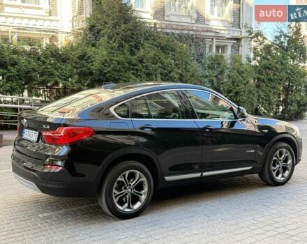 Черный БМВ Х4, объемом двигателя 2 л и пробегом 129 тыс. км за 24500 $, фото 1 на Automoto.ua