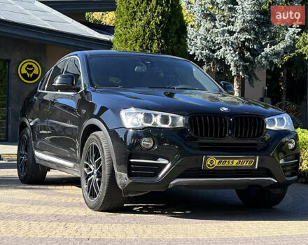 Чорний БМВ Х4, об'ємом двигуна 2 л та пробігом 73 тис. км за 29800 $, фото 1 на Automoto.ua