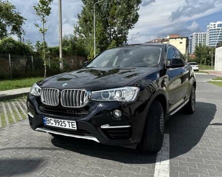 Черный БМВ Х4, объемом двигателя 2 л и пробегом 128 тыс. км за 26999 $, фото 1 на Automoto.ua