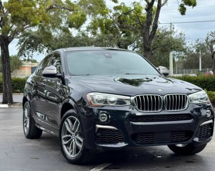 Черный БМВ Х4, объемом двигателя 3 л и пробегом 48 тыс. км за 16700 $, фото 1 на Automoto.ua