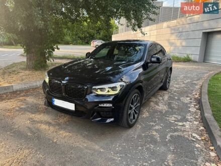 Черный БМВ Х4, объемом двигателя 2 л и пробегом 133 тыс. км за 33900 $, фото 1 на Automoto.ua