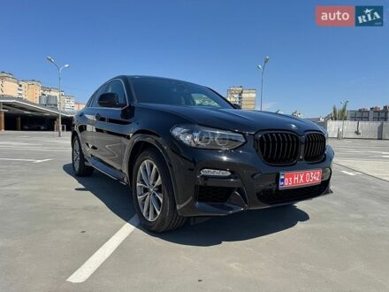 Черный БМВ Х4, объемом двигателя 2 л и пробегом 124 тыс. км за 33500 $, фото 1 на Automoto.ua