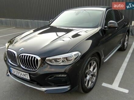 Черный БМВ Х4, объемом двигателя 2 л и пробегом 60 тыс. км за 41700 $, фото 1 на Automoto.ua