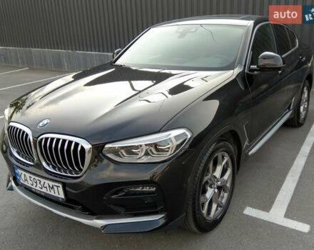 Черный БМВ Х4, объемом двигателя 2 л и пробегом 60 тыс. км за 41700 $, фото 1 на Automoto.ua
