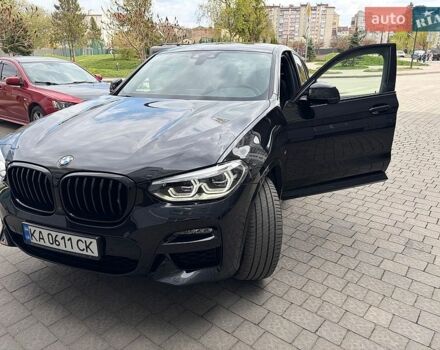 Черный БМВ Х4, объемом двигателя 2 л и пробегом 64 тыс. км за 58999 $, фото 1 на Automoto.ua