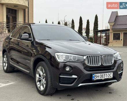 Коричневый БМВ Х4, объемом двигателя 2.99 л и пробегом 122 тыс. км за 24500 $, фото 1 на Automoto.ua