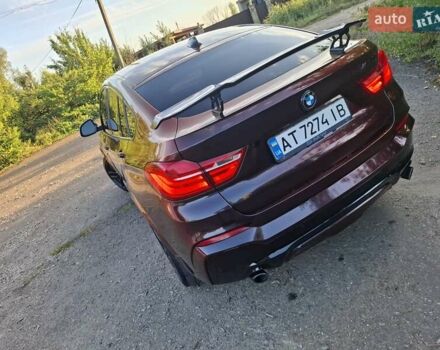 Коричневий БМВ Х4, об'ємом двигуна 3 л та пробігом 143 тис. км за 33777 $, фото 2 на Automoto.ua