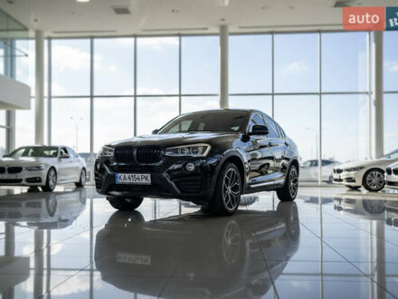 Коричневый БМВ Х4, объемом двигателя 2 л и пробегом 132 тыс. км за 20999 $, фото 1 на Automoto.ua