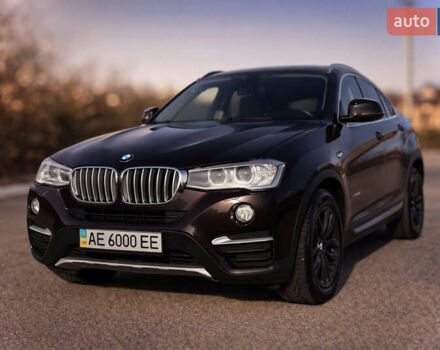 Коричневый БМВ Х4, объемом двигателя 2 л и пробегом 200 тыс. км за 21500 $, фото 1 на Automoto.ua