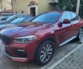Красный БМВ Х4, объемом двигателя 2 л и пробегом 65 тыс. км за 36900 $, фото 1 на Automoto.ua