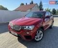 Красный БМВ Х4, объемом двигателя 2 л и пробегом 229 тыс. км за 19600 $, фото 1 на Automoto.ua