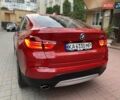 Красный БМВ Х4, объемом двигателя 2 л и пробегом 290 тыс. км за 19900 $, фото 6 на Automoto.ua