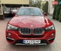 Красный БМВ Х4, объемом двигателя 2 л и пробегом 290 тыс. км за 19900 $, фото 1 на Automoto.ua
