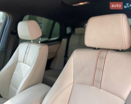 Красный БМВ Х4, объемом двигателя 2.98 л и пробегом 92 тыс. км за 21250 $, фото 11 на Automoto.ua