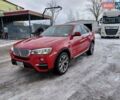 Красный БМВ Х4, объемом двигателя 2 л и пробегом 207 тыс. км за 16100 $, фото 1 на Automoto.ua