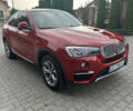 Красный БМВ Х4, объемом двигателя 2 л и пробегом 111 тыс. км за 29000 $, фото 1 на Automoto.ua