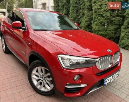 Красный БМВ Х4, объемом двигателя 2 л и пробегом 290 тыс. км за 19900 $, фото 1 на Automoto.ua