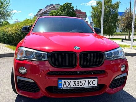 Красный БМВ Х4, объемом двигателя 3 л и пробегом 87 тыс. км за 27500 $, фото 1 на Automoto.ua