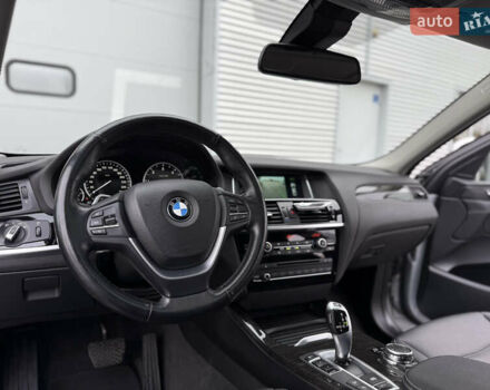 Серый БМВ Х4, объемом двигателя 2 л и пробегом 162 тыс. км за 23500 $, фото 26 на Automoto.ua