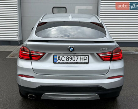 Серый БМВ Х4, объемом двигателя 2 л и пробегом 162 тыс. км за 23500 $, фото 10 на Automoto.ua