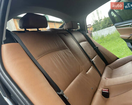 Серый БМВ Х4, объемом двигателя 2 л и пробегом 250 тыс. км за 16800 $, фото 45 на Automoto.ua