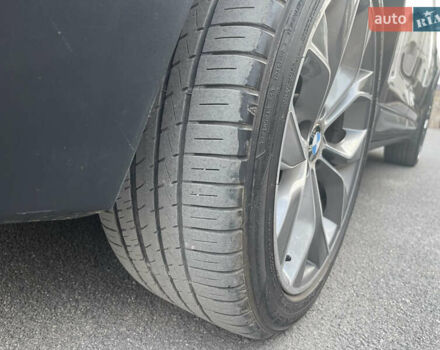 Серый БМВ Х4, объемом двигателя 2 л и пробегом 250 тыс. км за 16800 $, фото 18 на Automoto.ua