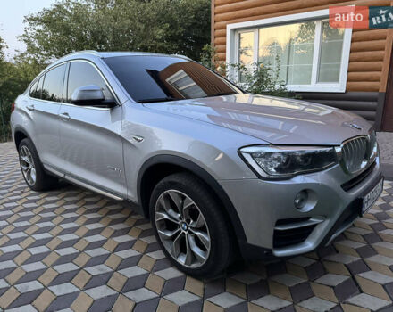 Серый БМВ Х4, объемом двигателя 2 л и пробегом 125 тыс. км за 25800 $, фото 1 на Automoto.ua