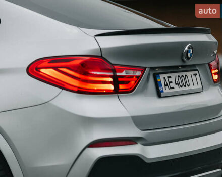 Серый БМВ Х4, объемом двигателя 2 л и пробегом 136 тыс. км за 23000 $, фото 4 на Automoto.ua