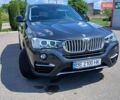 Серый БМВ Х4, объемом двигателя 2 л и пробегом 70 тыс. км за 25500 $, фото 1 на Automoto.ua