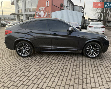Серый БМВ Х4, объемом двигателя 3 л и пробегом 105 тыс. км за 27499 $, фото 2 на Automoto.ua
