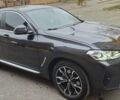 Серый БМВ Х4, объемом двигателя 2 л и пробегом 98 тыс. км за 49500 $, фото 1 на Automoto.ua