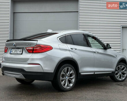 Серый БМВ Х4, объемом двигателя 2 л и пробегом 162 тыс. км за 23500 $, фото 1 на Automoto.ua