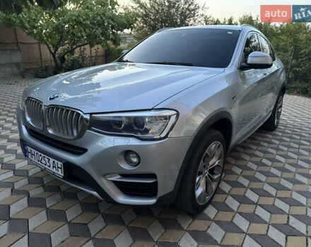 Серый БМВ Х4, объемом двигателя 2 л и пробегом 125 тыс. км за 25800 $, фото 1 на Automoto.ua