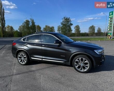 Серый БМВ Х4, объемом двигателя 2 л и пробегом 76 тыс. км за 28500 $, фото 1 на Automoto.ua