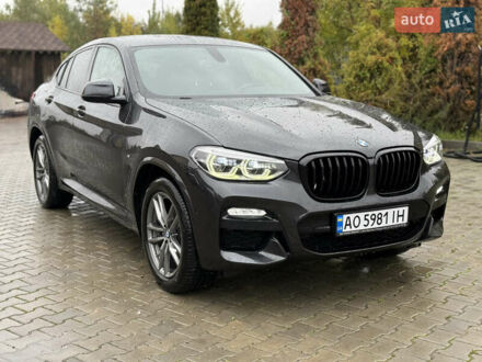 Серый БМВ Х4, объемом двигателя 2 л и пробегом 95 тыс. км за 39999 $, фото 1 на Automoto.ua