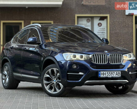 Синий БМВ Х4, объемом двигателя 2 л и пробегом 150 тыс. км за 24900 $, фото 6 на Automoto.ua