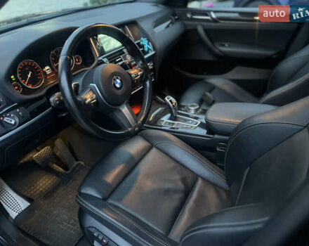 Синій БМВ Х4, об'ємом двигуна 2 л та пробігом 168 тис. км за 23500 $, фото 4 на Automoto.ua