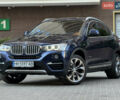 Синий БМВ Х4, объемом двигателя 2 л и пробегом 150 тыс. км за 24900 $, фото 1 на Automoto.ua