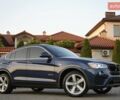 Синий БМВ Х4, объемом двигателя 2 л и пробегом 71 тыс. км за 22999 $, фото 1 на Automoto.ua