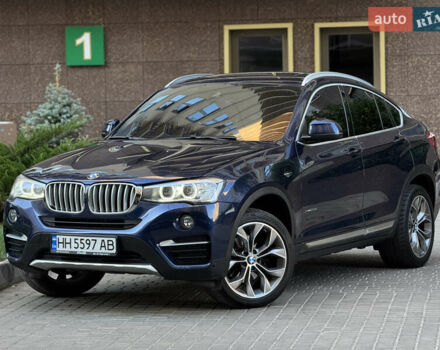Синий БМВ Х4, объемом двигателя 2 л и пробегом 150 тыс. км за 24900 $, фото 1 на Automoto.ua