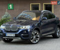 Синий БМВ Х4, объемом двигателя 2 л и пробегом 150 тыс. км за 24900 $, фото 1 на Automoto.ua