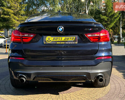 Синий БМВ Х4, объемом двигателя 3 л и пробегом 100 тыс. км за 20300 $, фото 5 на Automoto.ua