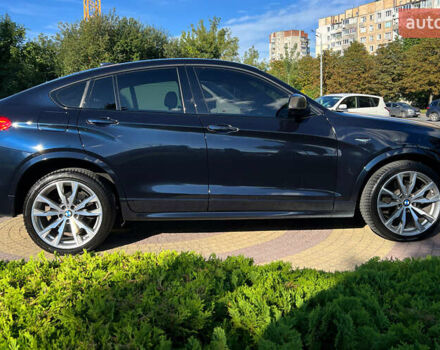 Синий БМВ Х4, объемом двигателя 3 л и пробегом 100 тыс. км за 20300 $, фото 7 на Automoto.ua